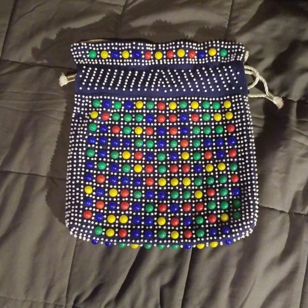 reversible multi colored hand bag